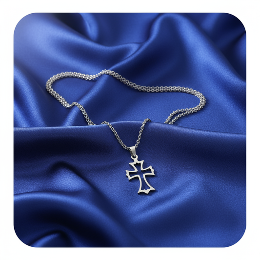 Cross necklace on blue satin background