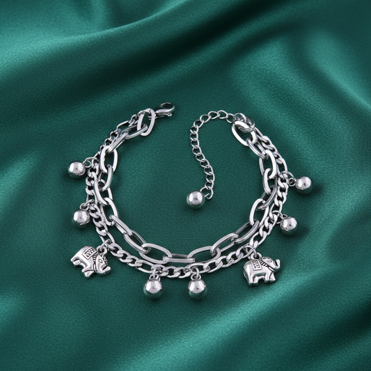 Elephant charm bracelet on emerald green satin