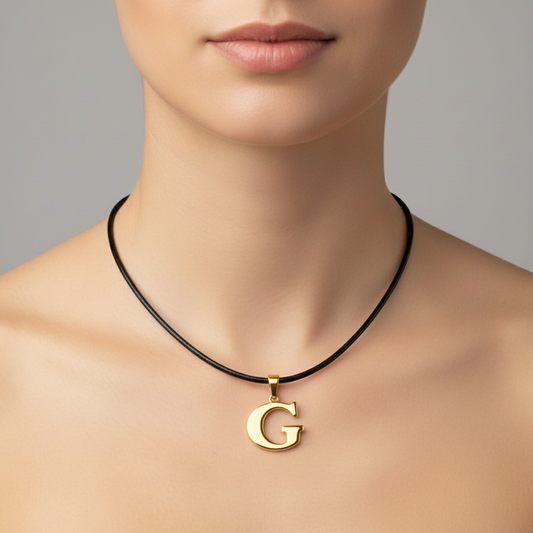 Gold G on Black Leather Cord