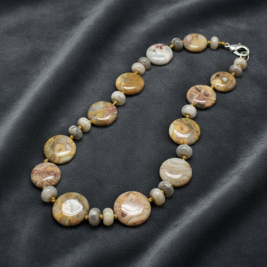 Necklace on fabric background