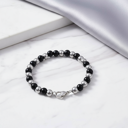 Black and Silver Beaded Bracelet on Beautiful Background