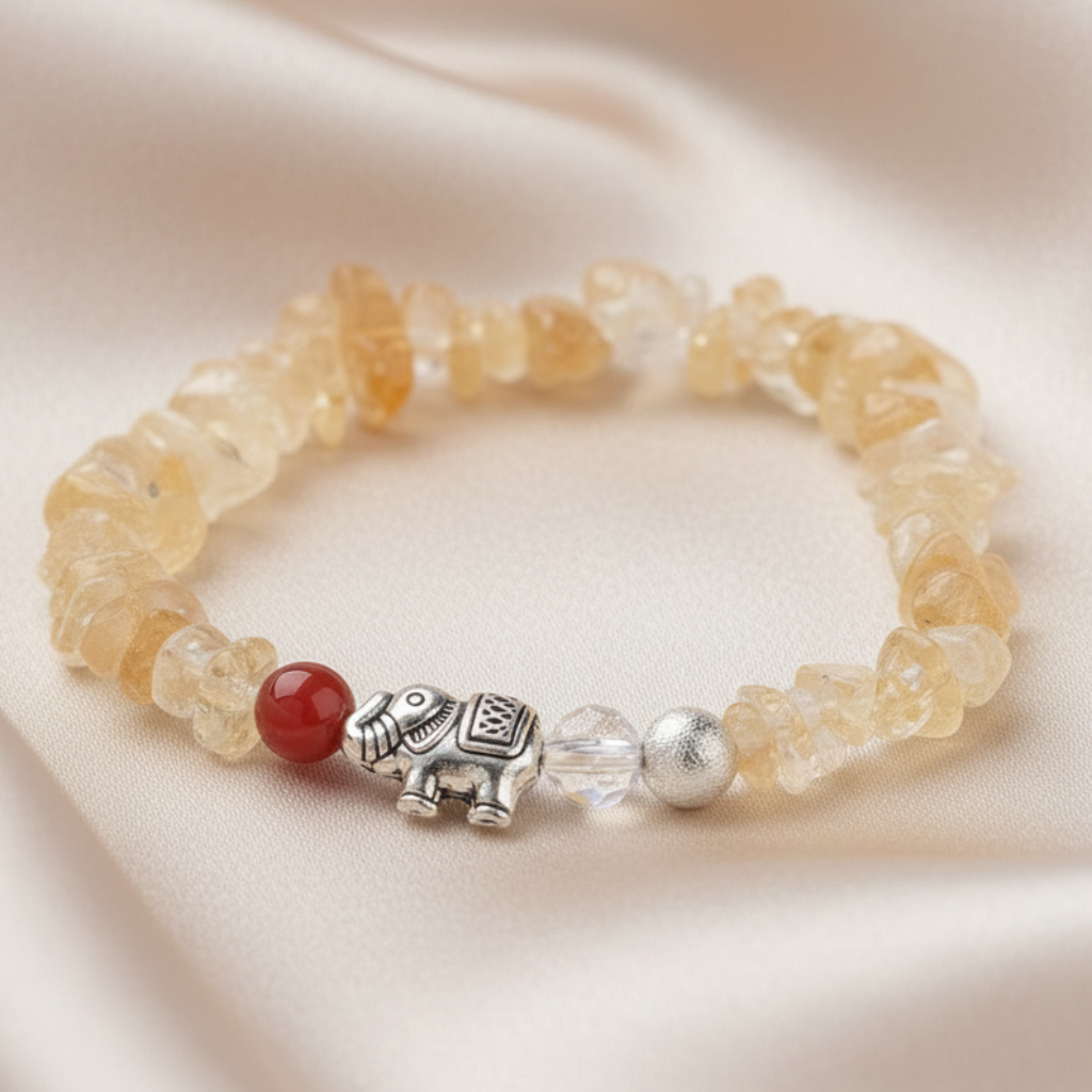 Citrine bracelet on champagne satin background