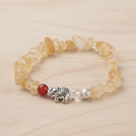 Citrine Chip Bracelet with Elephant Charm - Elegant Background