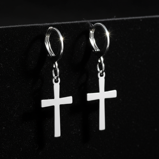 Cross hoop earrings on black velvet