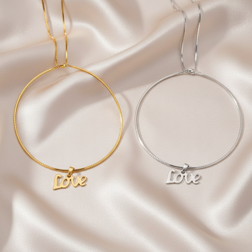 Gold and Silver Love Necklaces on Satin