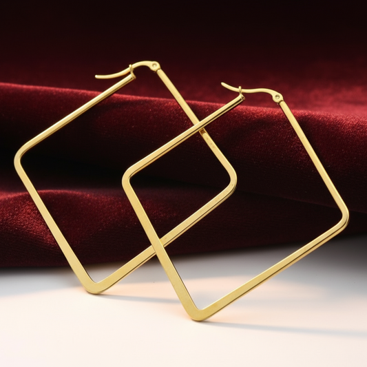 Gold hoops on burgundy velvet