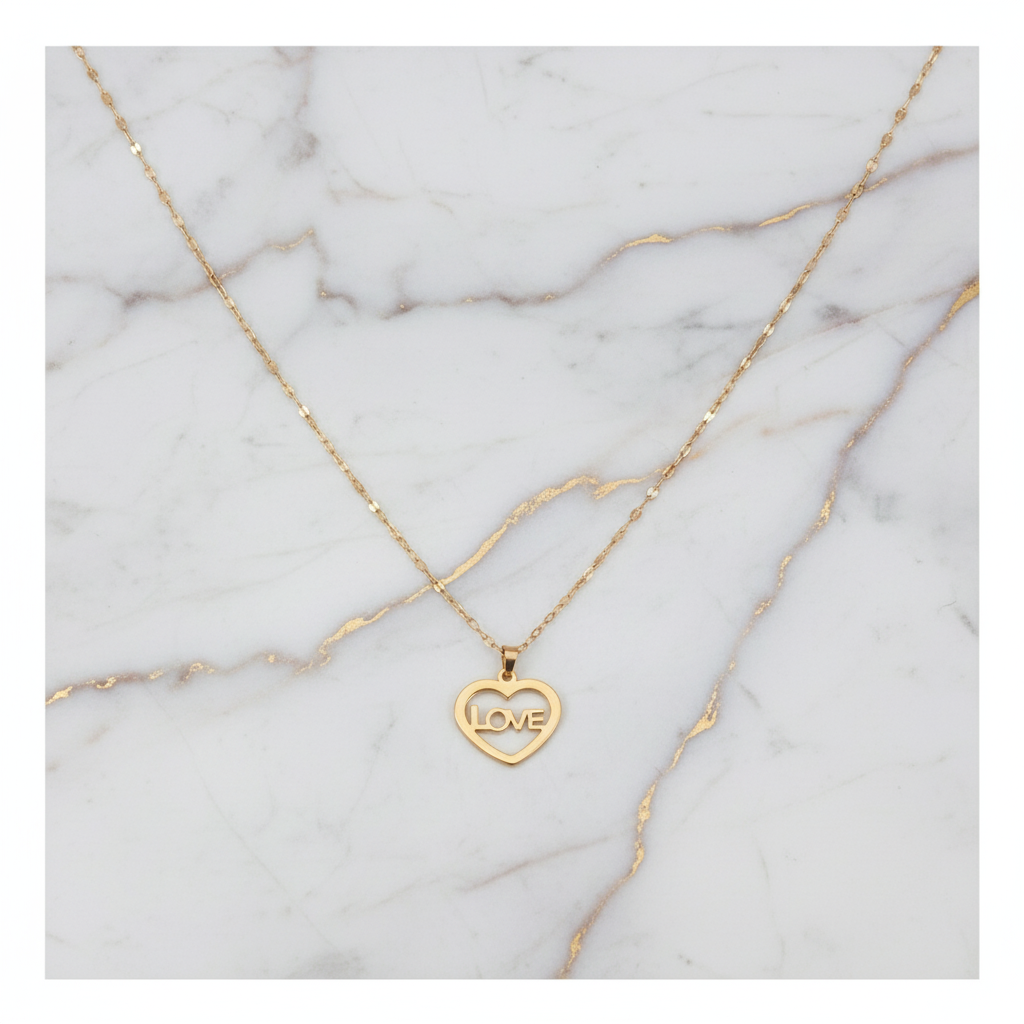 Gold Love Necklace on Marble