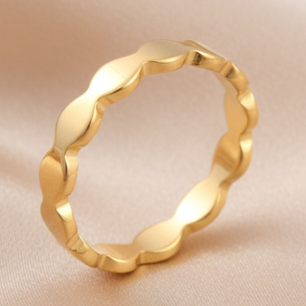 Gold Wavy Ring – Champagne Satin Background