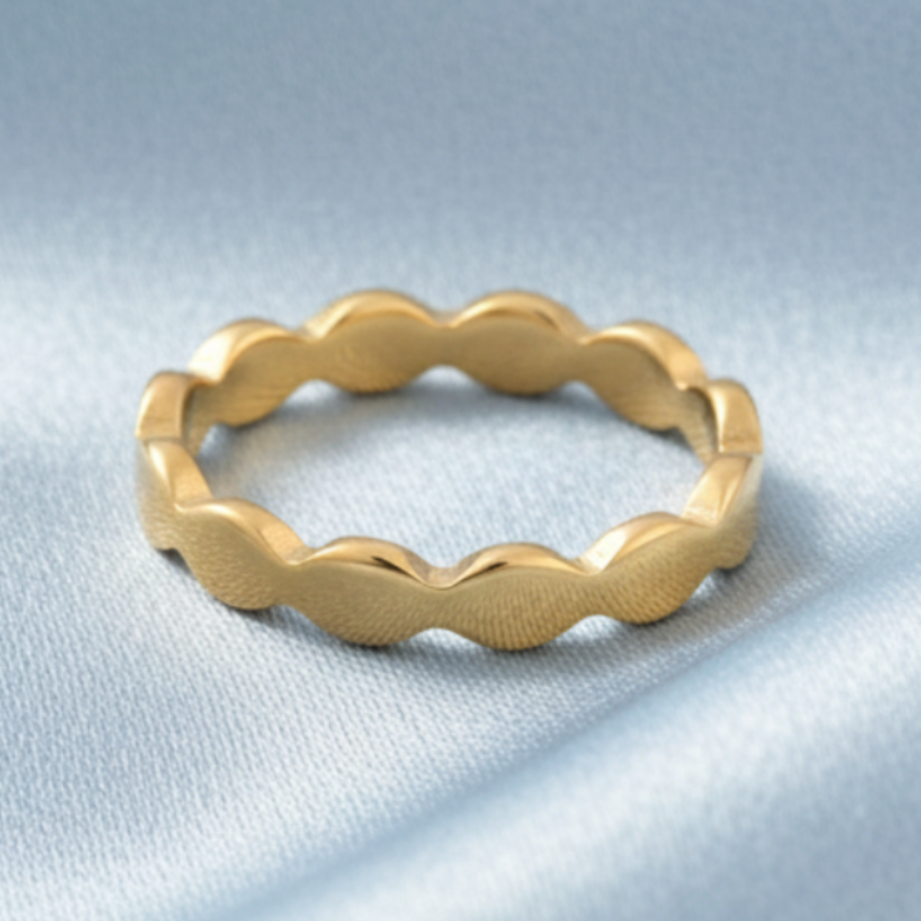 Gold Wavy Ring – Satin Light Blue Background