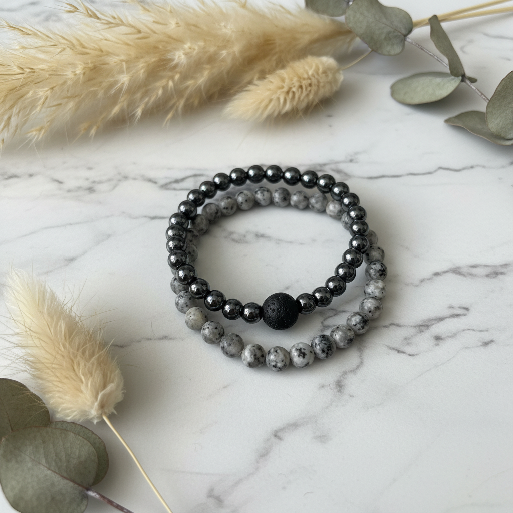Grey stone and hematite bracelet set with elegant background