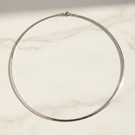 Omega chain on marble