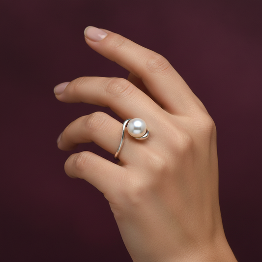 Pearl ring on model - burgundy background