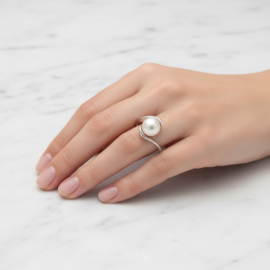 Pearl ring on model - marble surface