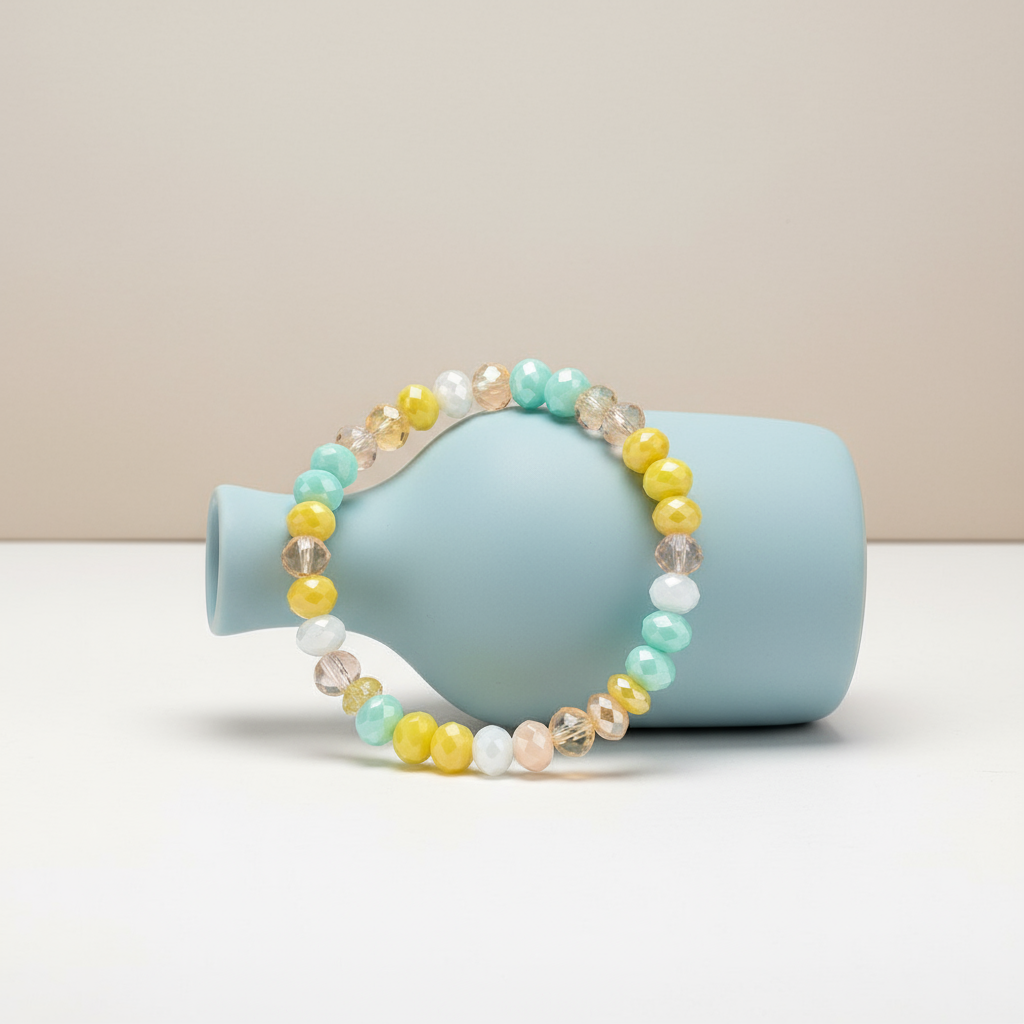 Pulsera Amarilla/Turquesa - Apoyada en Jarrón Caído